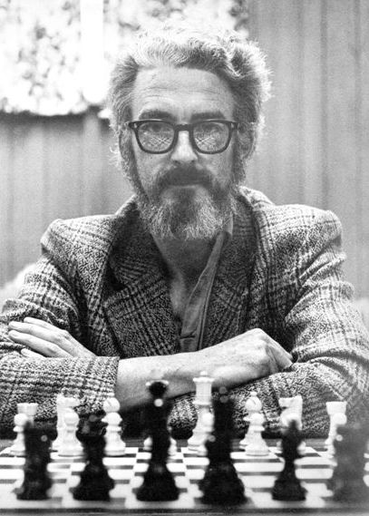 RJB Wilson in front of chess board, circa 1975